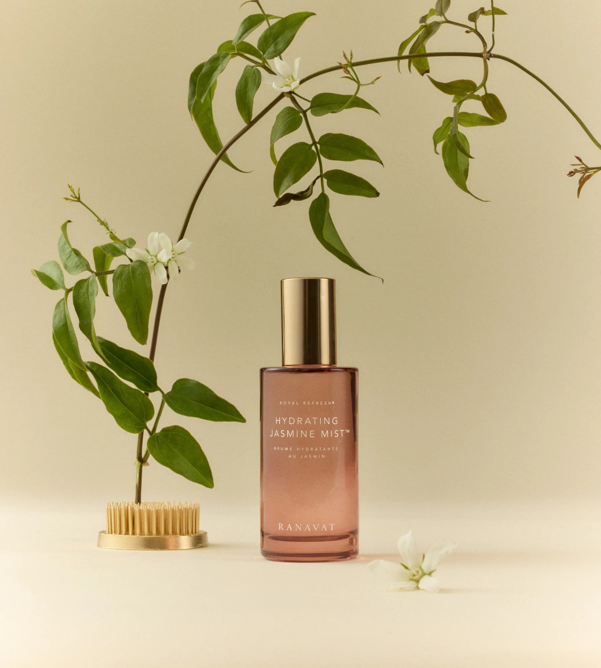 Botanical mist bottle with jasmine-inspired branches